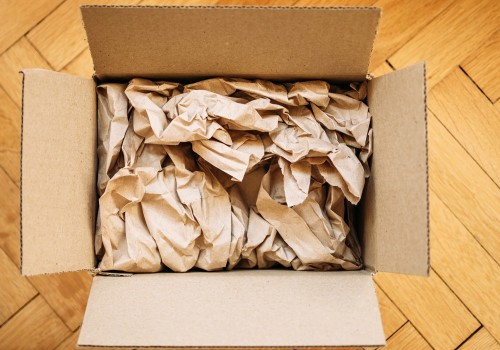 Filling Empty Spaces in Boxes with Foam Peanuts or Crumpled Paper
